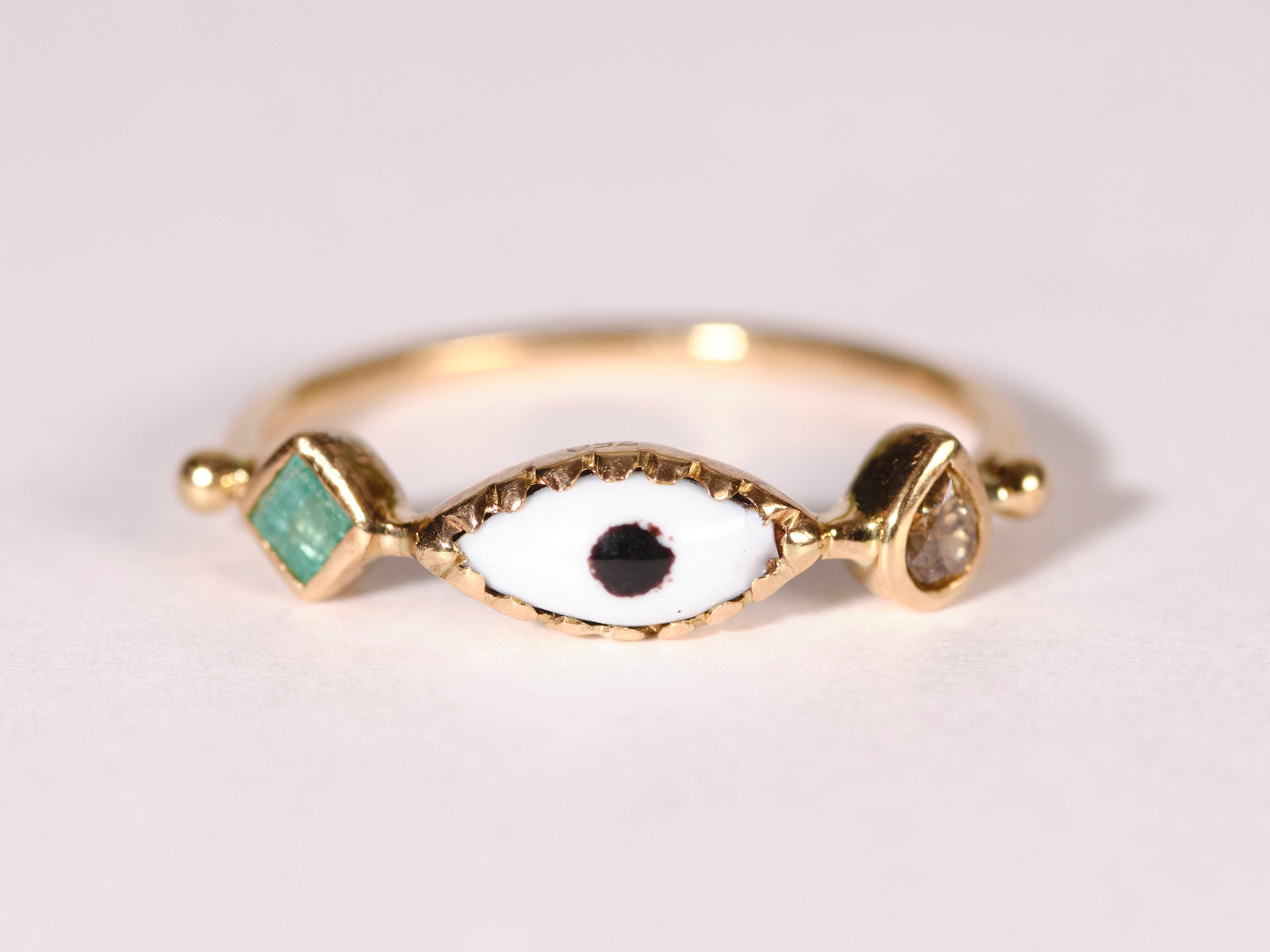 DORETTE | EYE RING WITH EMERALD AND DIAMOND