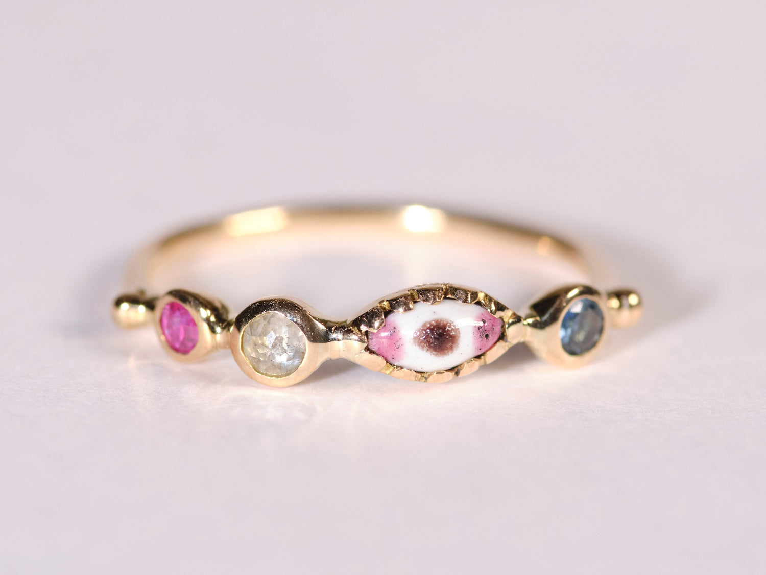 DORETTE | EYE RING WITH SAPPHIRE RUBY AND DIAMOND